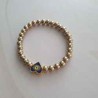 "Pulsera dorada Ojo Turco"